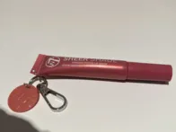 W7 lūpų blizgis - segasi prie raktų, kuprinės