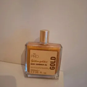 Kūno aliejus su blizgučiais