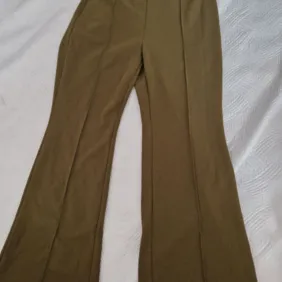 Chaki platėjančios kelnės L-XL